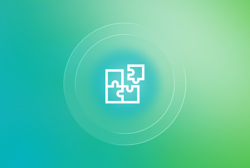 White puzzle piece icon centered within concentric circles on a teal and green gradient background.