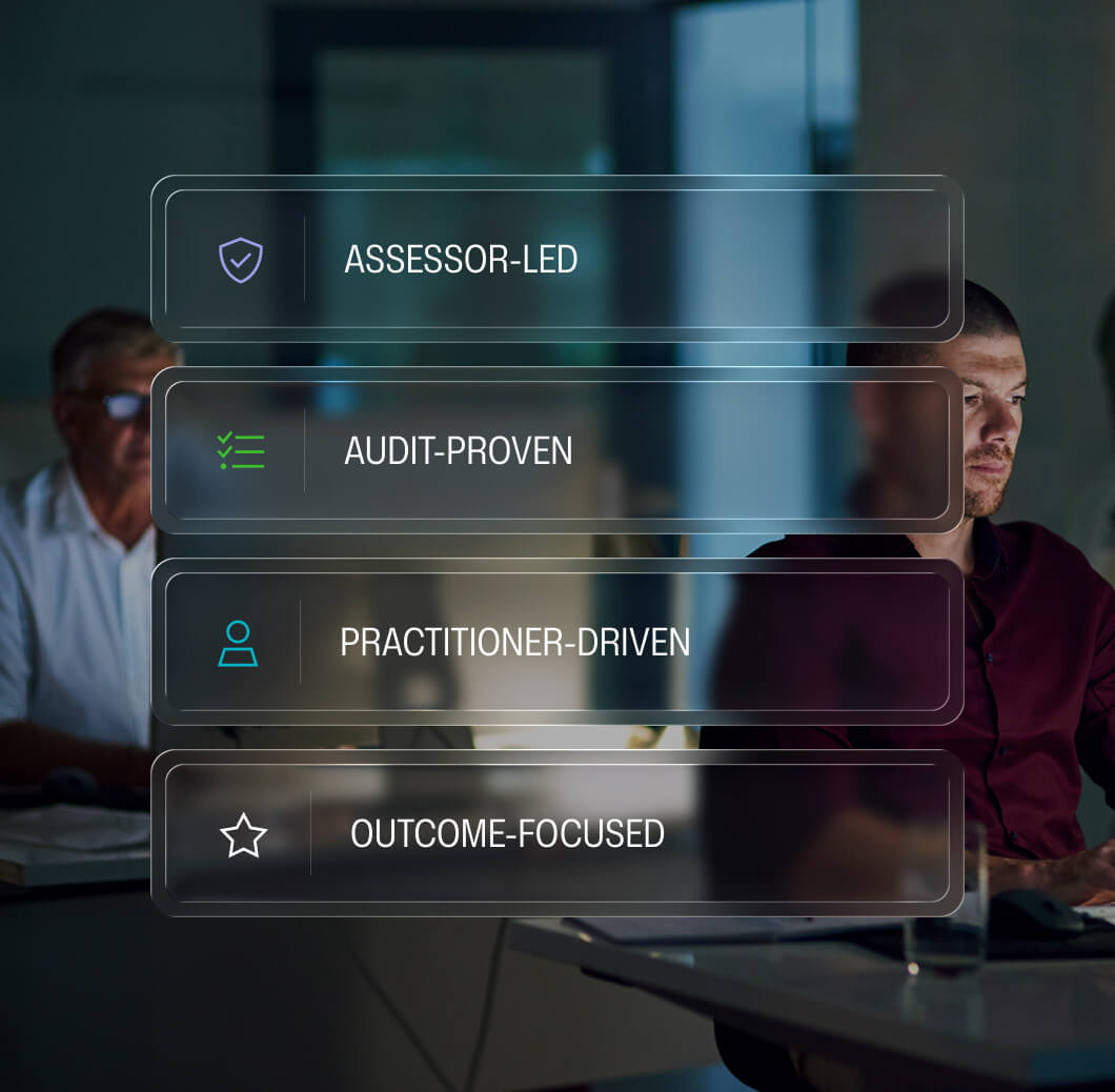 Professionals working at desks behind an overlay listing Fortreum's XRAMP pillars: Assessor-Led, Audit-Proven,